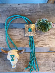 Leather braided necklace with gorgeous statement bolo concho with faux turquoise center stone. Measures: 35" Concho: 2.75" x 3.25" Bolo Necklace, Cowgirl Accessories, The Outlaw, Braided Necklace, Turquoise Jewelry, Pet Hair, Turquoise Bracelet, Turquoise Necklace, Sale Items