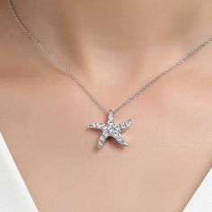 Fun and stylish. This starfish necklace is set with 1.01 carats total weight of Lafonn's signature Lassaire simulated diamonds in sterling silver bonded with platinum. The pendant comes on an adjustable 20" chain. Pendant measures approximately 0.75 inches from top to bottom and just over a 0.75 inches wide at widest point Includes pendant box Ships fully insured to point of delivery Elegant Starfish Charm Jewelry As Gift, Elegant Starfish Charm Jewelry For Gifts, Elegant Starfish Charm Jewelry Gift, Elegant Sterling Silver Jewelry With Starfish Charm, Elegant Jewelry With Starfish Charm, Elegant Star-shaped Jewelry With Starfish Charm, Elegant Starfish Necklace For Gift, Elegant Starfish Charm Pendant Jewelry, Elegant Starfish Charm Jewelry For Anniversary