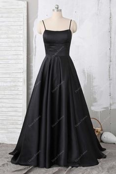 This classic black satin prom dress is perfect for flattering all body shapes. #promdress #eveningdress #homecomingdress Black Satin Prom Dress, Simple Elegant Dresses, Open Back Prom Dress, Dress Outfits Party, Prom Dresses For Sale, Black Satin Dress, Designer Prom Dresses, Satin Prom Dress, Grad Dresses