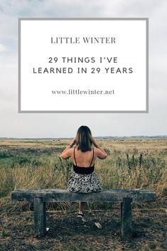 a woman sitting on a bench with the words little winter 29 things i've learned in 29 years