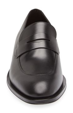 Rich calfskin leather elevates an Italian-crafted penny loafer that will make the perfect addition to your everyday office wardrobe. Leather upper and lining/leather, rubber and synthetic sole   Made in Italy   Hugo Boss/BOSS/HUGO has received the Fair Labor Association accreditation, which signifies that the company has effective systems and procedures in place to successfully uphold fair labor standards throughout its supply chains, including strategies and tools to address and improve working Office Loafers With Leather Lining And Plain Toe, Modern Calf Leather Loafers For Business, Classic Leather Loafers For Office, Modern Leather Loafers For Business Casual, Office Slip-on Goodyear Welted Loafers, Business Wingtip Loafers With Rubber Heel Cap, Goodyear Welted Slip-on Loafers For Office, Modern Calf Leather Loafers For Semi-formal Occasions, Modern Calf Leather Loafers For Business Casual