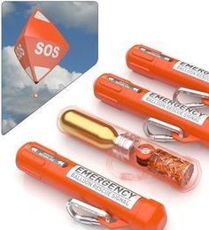 three orange lighters are next to each other with an image of a kite in the background