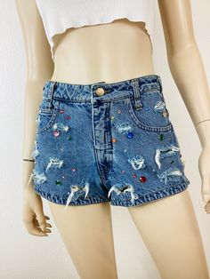 Vintage Jewel Studded Shorts colorful jem like studs faded denim intentionally distressed with frayed holes by Katharine hemnett appx size - S great vintage condition 26 waist 40 hip 10 length All sales are final Katharine Hamnett, Studded Shorts, Faded Denim, Distressed Denim Shorts, Vintage Jewels, Distressed Denim, Las Vegas, Denim Shorts, Gender Neutral