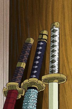 four different colored swords are on display in front of a wood paneled wall,