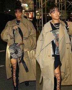 two women walking down the street in trench coats and thigh - high boots, one carrying a handbag