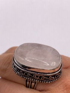 Vintage rose quartz Ring  Silver white bronze  NOT 925  Very detailed  Size 7 My jeweler can re size it for a $20 fee.  Ships free in the US in a nice gift box  Please check out our THOUSANDS of great feedback reviews Rose Quartz Crystal Ring Gift, Silver Rose Quartz Crystal Ring Gift, Vintage Moonstone Ring With Large Stone As Gift, Vintage Moonstone Ring With Large Stone For Gift, Silver Rectangular Moonstone Ring Gift, Rectangular Silver Moonstone Ring Gift, Spiritual Nickel-free Moonstone Ring As A Gift, Nickel-free Oval Crystal Ring Gift, Oval Rose Quartz Rings As Gift