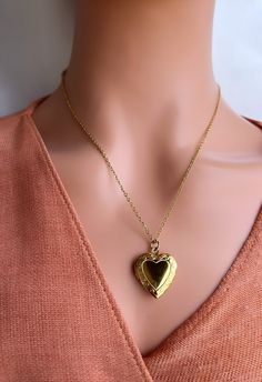 Gold Heart Necklace - Gold Heart Locket Necklace FEATURES -High Quality -Hypoallergenic -WATERPROOF -Tarnish Free -Nickel and Lead Free -Handmade in our workshop in USA -You can wear everyday! - - - - - - - - - - - - - - - - -  Chain Length 16 inches + 2 inches extender Pendant size 20 mm x 20 mm -------------------------- Material The necklace is %100 lead and nickel free 18K Gold Plated over stainless steel Free Shipping over 35$ Valentine's Day Heart Beads Locket Necklace Gift, Gold Heart Christmas Jewelry, Christmas Jewelry With Heart Charm, Heart-shaped Gold Jewelry For Christmas, Elegant Heart-shaped Christmas Jewelry, Gold Hallmarked Locket Necklace For Valentine's Day, Christmas Heart Charm Jewelry, Christmas Heart-shaped Gold Jewelry, Gold Heart-shaped Christmas Jewelry