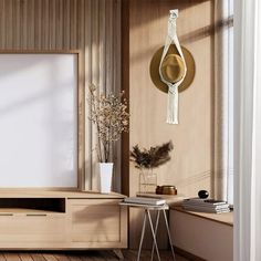 a living room with wooden flooring and white walls