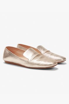 These sleek loafers are made from the highest quality leather, and were crafted with a special Italian construction, “sacchetto,” to give them next-level comfort and flexibility. Normally reserved for ballet slippers (which are known to fit like a glove), this technique involves stitching the upper lining and the insole of the shoe in a precise sequence. The result? A flexible fit that molds to your feet and allows for ultimate stretch. The base of the shoe is lined with an extra-supportive laye Elegant Slip-ons For Spring Galas, Elegant Slip-on Calf Leather Loafers, Elegant Leather-lined Pointed Toe Slip-ons, Elegant Slip-ons With Rubber Sole For Galas, Elegant Slip-ons With Leather Footbed And Pointed Toe, Chic Slip-on Loafers With Leather Lining, Elegant Tassel Loafers With Textured Sole And Almond Toe, Slip-on Calf Leather Loafers For Galas, Elegant Slip-on Loafers With Rubber Sole