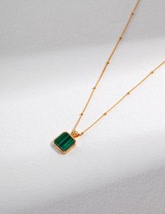 Our Gold-Framed Square Malachite Necklace Is Really The Necklace When You Think Of Elegance And Nature Señorita J's Square Gold Framed Green Malachite Necklace is a tribute to the beauty of nature and classic style. The centre of this beautiful necklace is a square green malachite stone known for its vivid green colours and natural streak patterns. The beautifully made gold frame surrounding the malachite stone's sides and back makes it look even more elegant and appealing.This necklace can be w Malachite Earrings, Malachite Necklace, Malachite Pendant, Malachite Jewelry, Square Pendant, Stone Gold, Boutique Jewelry, Chain Pendants, Minimalist Jewelry