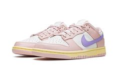 The Women’s Nike Dunk Low “Pink Oxford” is a women’s-exclusive colorway of the retro basketball shoe with a spring-ready vibe.  The “Pink Oxford” features a combination of pastel colors on its design, beginning with its Pink Oxford leather overlays.  A Light Thistle-colored Swoosh appears on the sides of the shoe.  The same lavender-colored purple hue can be found on the “Nike” branding stitched onto the heel.  Additional Pink Oxford accenting comes into play on the “Nike” and Swoosh logos on th Dunk Low Pink Oxford, Low Dunk Nike, Pink Oxford Shoes, Womens Dunk Low, Retro Basketball Shoes, Dunks Nike, Oxford White, Nike Brand, Pink Nikes