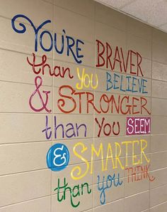 a wall with writing on it that says, you're brave and be strong than you seem smarter