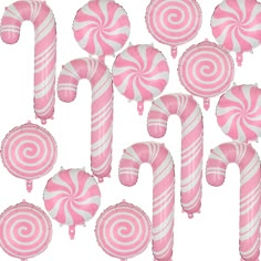 pink and white candy canes arranged in the shape of balloons