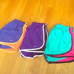 Never Worn!! The Blue And Orange Are Sold Nike Multicolor Sports Bottoms, Purple Sporty Shorts For Spring, Nike Multicolor Casual Bottoms, Nike Casual Multicolor Bottoms, Purple Athletic Shorts For Spring Sports, Casual Multicolor Nike Bottoms, Casual Purple Sports Shorts, Nike Purple Athleisure Bottoms, Stretch Nike Shorts In Purple