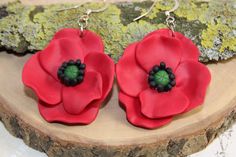 Red poppy dangle earrings, made of polymer clay. It is very lightweight. Length of the earrings: 4m / 1.5" Thank you for your visit. Polymer Clay Poppy Earrings, Clay Poppy, Red Statement Earrings, Poppy Earrings, Red Flower Earrings, Red Poppy, Earrings Red, Red Flower, Red Poppies