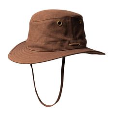 The Tilley Endurables TH5 Hemp Outdoor Mid-Brim Hiker Hat, designed with amodest brim, is made from breathable hemp fabric that is naturally resistant to UV light, mold, mildew, salt water and sweat. Although the Hemp Hats have a soft linen-like look, they are incredibly durable and strong."It may look linen, but hemp is a durable, tough as nails fabric that is well suited for outdoor and active use, whether you're out on the lake or hiking in the mountains." The hat is designed to last for year Hemp Hat, Tilley Hat, Wind Machine, Upf Clothing, Outback Hat, Safari Chic, Crochet Sun Hat, Plain Canvas, Types Of Hats