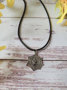 This black cord spider web necklace is perfect birthday gift or stocking filler for gothic souls, emo spirits and lovers of all things witchy and alternative. It also makes a perfect halloween necklace. Waxed Black Cord with lobster clasp and extension chain Length is approx 51.2 cm/ 20.2 inch (include clasp and chain) Width is 2mm/0.01 inch. Comes in organza bag with charm attached. Gothic Adjustable Necklace For Halloween, Gothic Halloween Adjustable Necklace, Adjustable Gothic Necklace For Gifts, Adjustable Choker Necklace For Halloween, Adjustable Gothic Pendant Necklace, Black Halloween Necklace With Lobster Clasp, Adjustable Black Necklace For Halloween, Gothic Black Necklace For Gift, Black Pendant Necklace For Halloween