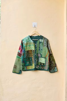 Indian Handmade Black Kantha Patchwork Quilted Jacket, Stylish Patchwork Women's Coat, Winter Spring Reversible Kantha Jacket for Her Size Chart- Medium Size- CHEST- 40 INCHES LENGTH- 21.5 INCH SLEEVE- 23 INCH Large Size- CHEST- 42 INCH LENGTH- 21.5 INCH SLEEVE- 23 INCH XL Size- CHEST- 44 INCHES LENGTH- 22 INCHES SLEEVE- 23 INCHES XXL Size- CHEST- 46 INCHES LENGTH- 22 INCHES SLEEVE- 23 INCHES NOTE- AS THE JACKETS ARE HANDMADE, EXPECT A SIZE VARIATION OF +-0.5 INCHES. Kantha Patchwork Quilt, Patchwork Quilt Jacket, Jacket Patchwork, Quilt Coat, Boho Vest, Kantha Jacket, Reversible Coat, Patchwork Jacket, Coat Winter