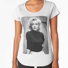 Regular fit t-shirt with scoop neck, capped sleeves, and curved hem for style. Solid colors are 100% cotton, heather colors are cotton blend. Range of colors available, with the option to print on front or back. Size range XS-XL. Marilynn Monroe Black and White Portrait. Modern Fitted T-shirt With Graphic Print, Fitted Tops With Graphic Print And Scoop Neck, Trendy Cotton Scoop Neck T-shirt, Trendy Scoop Neck Top With Graphic Print, Trendy Cotton T-shirt With Scoop Neck, Casual Graphic Print Scoop Neck Top, Trendy Scoop Neck Cotton T-shirt, Vintage Cotton Scoop Neck Top, Portrait Women