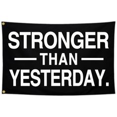 a black and white banner with the words,'stronger than yesterday'on it