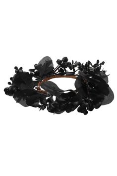 a black headband with flowers and leaves on it