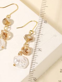 How gorgeous are the Topaz Pearl Dangly Earrings?! You will look so good in these! Charm: 1.25" Tall Dangly Earrings, Topaz