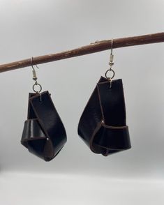 These are fun boho leather earrings. Rustic style earrings. Handmade in Los Angeles, USA. Please note that this is a handmade item made from leather scraps and may have slight imperfections or color variations. Leather And Metal Jewelry, Handmade Leather Everyday Earrings, Handmade Leather Earrings For Everyday, Everyday Handmade Leather Earrings, Handmade Leather Dangle Earrings, Handmade Faux Leather Dangle Jewelry, Handmade Brown Earrings For Everyday Use, Handmade Leather Earrings For Festivals, Handmade Leather Earrings For Gifts