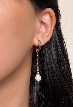 Made with real freshwater pearls. 18k gold plated paperclip chain with 18k gold stainless steel hoop earrings.  The pearl charms can be taken off the hoop as seen in the photo. The hoop can be worn by itself!  Perfect for any occasion! If you would like the chain shorter or longer please let me know! Tarnish Resistant Dangle Pearl Earrings For Everyday, Everyday Tarnish Resistant Dangle Pearl Earrings, Gold Minimalist Hoop Earrings With Pearl Chain, Everyday Dangle Earrings With Paperclip Chain, Gift 14k Gold Hoop Earrings With Pearl Chain, Everyday Paperclip Chain Dangle Earrings, Gold Paperclip Chain Drop Earrings, Gold Paperclip Hoop Earrings As Gift, 14k Gold Filled Dangle Jewelry With Paperclip Chain