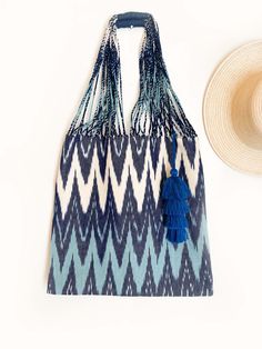 A stylish tote bag that has plenty of room to hold everything you need for a day at the beach, the farmer's market or as everyday tote. From your towel to sunscreen and wallet, you can carry all of your beach essentials. This bag is crafted from textured cotton canvas fabric. These bags are handwoven by skilled artisans in Momostenango, Guatemala on traditional backstrap looms. Madre Luna recognizes the importance of heritage, high quality and craftsmanship. We partner with cooperatives, small a Rectangular Hobo Bag For Daily Beach Use, Rectangular Hobo Bag For Daily Use And Beach Season, Eco-friendly Hobo Bag With Adjustable Strap For Vacation, Bohemian Handwoven Bags For Vacation, Bohemian Handwoven Shoulder Bag For Vacation, Summer Style Double Handle Hobo Bag For Daily Use, Vacation Double Handle Hobo Bag For Beach Season, Summer Tote Hobo Bag With Adjustable Strap, Summer Hobo Bag With Adjustable Strap