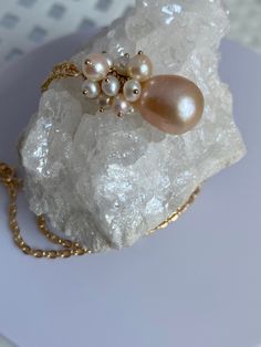 "This is a gorgeous iridescent Pearl. Beautiful baroque markings and lovely mauve, pink purple color.   The 14k gold filled chain is 20\"  The baroque pearl is from the 70's or 80's. The pearl has a thick nacre and hard to find at this price point.  Handmade at my summer bench in Boston." High Luster Briolette Pearl Necklace As Gift, High Luster Pearl Pendant Necklace Gift, High Luster Briolette Pearl Necklace For Gift, Briolette High Luster Pearl Necklace Gift, Elegant Iridescent Pearl Necklace For Gift, Elegant Purple Pearl Pendant Necklace, Pink Baroque Pearl Necklace With Pearl Charm, Pink Baroque Pearl Drop Jewelry, Luxury Pink Baroque Pearl Necklaces