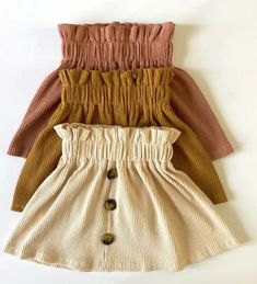 Ribbed Skirt with a stunning ruffle waist and button detailing. Material: 90% Cotton 5%Spandex Colour: brown, beige and pink Machine washable cool wash Pink Machine, Beige And Pink, Ribbed Skirt, Girls Clothing Sets, Clothing Sets, Brown Beige, Girls Clothing, Outfit Sets, Primary Colors