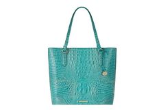 Melbourne Collection by BRAHMIN, the Mermaid Green Ezra Tote Bag features: Leather  Zip top closure Gold hardware Back slide-in pocket Double kangaroo with pen pocket Interior zip pocket Jewelry pocket and key clip Adjustable shoulder straps Bottom feet  Approx. 15.25'' W x 13.25'' H x 6.5'' D Pocket Jewelry, Mermaid Green, Key Clip, Slide In, Zip Top, Gold Hardware, Shoulder Straps, Kangaroo, Bags Handbags