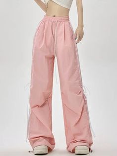 𝔇𝔢𝔱𝔞𝔦𝔩𝔰: Style: Casual, Streetwear, Bloke core Materials: Spandex Quantity: 1 pc These lightweight pants are designed in a pastel color scheme, ideal for the summer season. The ribbon accents add a touch of femininity to this casual piece, perfect for a laid-back yet fashionable outfit. Enjoy free shipping with a purchase of over 80$ SIZE LENGTH WAIST HIPS 39 in 25 in 50 in M 41 in 26 in 51 in L 41 in 27 in 52 in XL 42 in 28 in 53 in Item measured by hands may have 1-2 in differences.SIZE LENGTH WAIST HIPS 102 cm 60 cm 123 cm M 103 cm 64 cm 127 cm L 104 cm 68 cm 131 cm XL 106 cm 72cm 135cm Item measured by hands may have 2-3 cm differences. Trendy Pink Parachute Pants For Spring, Pink Casual Parachute Pants For Summer, Casual Pink Nylon Pants, Casual Pink Parachute Pants For Summer, Pink High Waist Parachute Pants For Spring, Spring Nylon Pink Pants, Pink Nylon Casual Parachute Pants, Trendy Pink Drawstring Pants, Pink Parachute Pants With Pockets For Summer