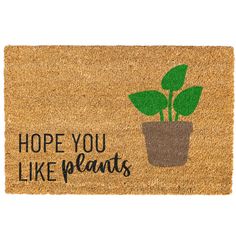 a door mat with a potted plant on it that says, hope you like plants