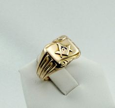 "Vintage 10K yellow gold Masonic ring circa 1940. A classic ring with great symbolism. FREE SHIPPING! Details: 10K Yellow Gold: (as shown in photos) Ring Size: 8 1/2 Total Weight: 6.3 grams FREE domestic shipping by USPS Priority Mail Signature Confirmation and includes insurance. If the item is to be shipped internationally Etsy will calculate postage. Please notify us at purchase if you are buying more than one item and we will gladly combine shipping. 7 day \"no hassle\" return policy money b Classic Yellow Gold Signet Ring With Maker's Mark, Classic Yellow Gold Engraved Ring With Maker's Mark, Classic Engraved Yellow Gold Ring With Maker's Mark, Heirloom 14k Gold Jewelry With Maker's Mark, Classic Yellow Gold Jewelry With Maker's Mark, Classic Yellow Gold Collectible Rings, Heirloom Gold Ring With Maker's Mark, Antique 14k Gold Rings With Maker's Mark, Yellow Gold Engraved Ring With Maker's Mark