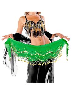 a woman wearing a green belly dance costume