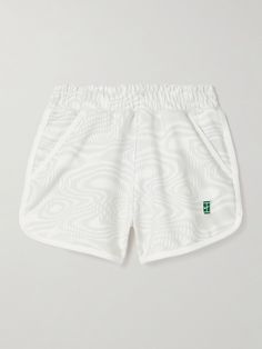 Nike's shorts are meant for the tennis court - look closely and you'll notice the logo appliquéd at the hem is designed to look like one. Cut from lightweight, moisture-wicking Dri-FIT, they're printed with subtle swirls and have an elasticated waistband. Wear them with the matching hoodie. Tennis Bottoms With Built-in Shorts, Tennis Bottoms With Built-in Shorts In Cotton, Cotton Tennis Bottoms With Built-in Shorts, Tennis Bottoms With Moisture-wicking Short, Tennis Bottoms With Moisture-wicking Fabric, White Tennis Sportswear Bottoms, White Sportswear Tennis Bottoms, Tennis Athletic Shorts With Built-in Shorts, White Tennis Bottoms With Built-in Shorts