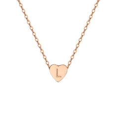 The charming Heart Initial Necklace features a heart-shaped pendant, capturing the essence of your love. Wear it to embrace a personal connection and showcase your affection in a stylish and meaningful way. Personalized Heart Necklace As Gift For Her, Rose Gold Heart Necklace With Heart Beads, Rose Gold Heart-shaped Necklace With Heart Beads, Personalized Minimalist Rose Gold Heart Necklace, Minimalist Adjustable Heart Necklace, Rose Gold Necklace With Heart Charm And Initial Pendant, Classic Heart-shaped Personalized Necklace, Everyday Double Heart Rose Gold Necklace, Heart-shaped Necklace With Adjustable Chain For Mother's Day