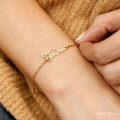 Discover the beauty of our Tiny Name Bracelet: Celebrate precious moments with our delicate Personalized Tiny Name Bracelet. Its elegant design, featuring a dainty chain and charming cursive font, makes it a cherished everyday accessory for those who adore minimal jewelry. Whether it's for Mom or a special someone, this bracelet adds a touch of sophistication to any outfit. * Material: Crafted from top-notch Stainless Steel for enduring quality. * Finish: Available in Sterling Silver, 18K Gold, Customized Dainty Bracelets, Adjustable Chain Bracelet With Custom Name, Personalized Gift Name Bracelet With Adjustable Chain, Delicate Personalized Charm Bracelet, Customized Name Bracelet For Wedding, Customized Dainty Bracelets For Everyday, Custom Name Bracelet For Wedding, Personalized Gift Bracelet With Adjustable Chain, Personalized Gift Bracelets With Adjustable Chain