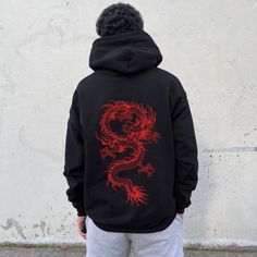 Available In Unisex S, M, L, Xl, And Xxl. Just Place An Order And Let Us Know Your Size! Japanese Streetwear Dragon Hoodie, Bold Graphic Design, Trendy Urban Fashion, Edgy Street Style Stay Warm And Stylish With Our Unisex Dragon Hoodie, Perfect For Any Season. Crafted From Soft Polyester, It Provides Comfort While Keeping You Cozy. The Hoodie Features A Bold Dragon Design, Kangaroo Pocket, Adjustable Drawstring Hood, And Ribbed Cuffs For A Perfect Fit. Whether You’re Chilling At Home Or Heading Edgy Street Style, Bold Graphic Design, Dragon Hoodie, Fashion Edgy, Street Style Edgy, Japanese Streetwear, Dragon Design, Colorful Hoodies, Urban Fashion