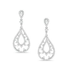 A fun look, these diamond drop earrings add shimmer to her wardrobe. Crafted in cool 10K white gold, each earring features a sparkling diamond-lined open pear-shaped dangle with a flirty diamond pattern. A diamond-adorned bridge and post setting complete this playful style. Radiant with 1 ct. t.w. of diamonds and a brilliant buffed luster, these post earrings secure comfortably with friction backs. Diamond Pear-shaped Chandelier Earrings, White Gold Teardrop Chandelier Earrings With Diamond Accents, White Diamond Drop Earrings With Accents, Teardrop Diamond Pierced Earrings, White Teardrop Earrings With Diamond Accents, White Sparkling Pear-shaped Earrings, Formal White Teardrop Earrings With Diamond Accents, Formal White Sparkling Teardrop Earrings, White Diamond Teardrop Earrings Fine Jewelry