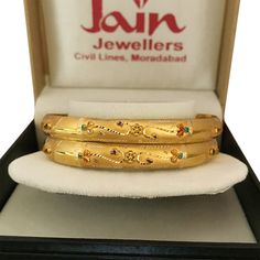 "Please contact us for any discounts or offers that are available on this item. As these gold bangles are very light in weight, after making these bangles, we put a protective metal bangle on the inner surface of the original gold bangles, as shown in the 4th image, this provides strength & shape to the bangles. Please Note:- The bangles are made out of Real Solid Gold & the metal bangles are just for support & durability. All Sizes available. We take absolute care of precious jewels Plain Gold Bangles, Metal Bangles, Bridal Jewelry Sets Brides, Gold Bracelet Simple, Indian Bangles, New Gold Jewellery Designs, Gold Bangle Set, Beautiful Gold Necklaces, The Bangles