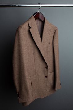 A handmade bespoke jacket crafted from a beautiful 100% wool tweed fabric with a remarkable birdseye texture. As far as Fall/Winter jackets are concerned, this is one of the most versatile and classic. Pair it with everything from flannel trousers to jeans; it is sure to became a wardrobe favorite. Fall Tweed Suits With Lapel Collar, Business Casual Wool Tweed Jacket With Pressed Crease, Business Casual Wool Tweed Jacket, Formal Tweed Jacket With Hidden Buttons, Tailored Wool Tweed Jacket With Pressed Crease, Winter Tweed Suits With Lapel Collar, Notch Lapel Tweed Jacket With Hidden Buttons, Tweed Notch Lapel Jacket With Hidden Buttons, Tweed Suits With Lapel Collar For Winter