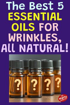 Pin with purple background. Text reads "The Best 5 ESSENTIAL OILS FOR WRINKLES, ALL NATURAL!" in light blue, yellow, and pink. Below, four amber glass essential oil bottles with black caps are shown, each labeled with a golden question mark. Oh Mighty Health logo in bottom right corner. Anti Wrinkle Essential Oils, Fresh Aloe Vera Gel, Essential Oil Beauty, Fresh Aloe Vera