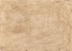 an old paper textured background with some stains on the edges and one corner missing