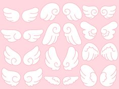 white angel wings on a pink background