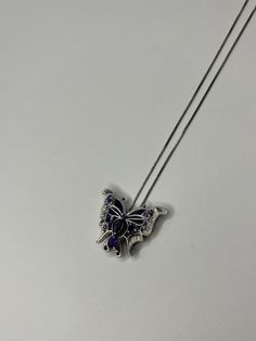 Sterling Silver Amethyst Butterfly Pendant Necklace. This necklace measures 18 inches in length; pendant measures 3/4 inch in length and 1 inch in width; necklace weighs a total of 6.36 grams. Both necklace and pendant are tested and stamped sterling silver. This pre-owned necklace is in good condition and is ready to be worn!  Necklace is exactly as shown in photos.  Willing to answer any questions and send more pictures if requested, please feel free to ask! Please come check out other stunnin Formal Purple Pendant Necklace, Stamped 925 Amethyst Necklaces, Purple Hallmarked Necklace, Purple Necklace With Large Pendant, Purple Necklace With Large Round Pendant, Purple Pendant Necklace With Large Pendant, White Gold Amethyst Necklace Hallmarked, Purple Hallmarked Round Pendant Necklaces, Purple Sterling Silver Formal Necklace