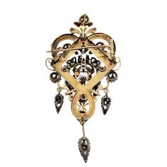 This is part of Chairish’s Fine Jewelry assortment.  A fine 18K yellow gold Victorian brooch with portions topped with silver. The brooch has old mine cut diamonds and drops. It is quite elaborate and ornate, and in excellent condition. It tests 18K and silver and there are no marks. Condition is excellent. A bale could be added to allow it to be worn as a pendant, but right now, it is in its original condition with it's original C clasp. Antique Yellow Gold Brooches With Intricate Design, Victorian Gold Diamond Brooches, Ornate Gold Brooch With Rose Cut Diamonds, Ornate Gold Brooches With Rose Cut Diamonds, Victorian Diamond Brooch For Evening, Ornate Diamond Brooch With Intricate Design, Ornate Diamond Brooches With Intricate Design, Victorian Diamond Brooch With Hallmark, Victorian Hallmarked Diamond Brooches