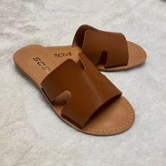 Girls Cognac Tan Flat Sandals. Sper Cute And Comfortable. Brand New And Comes In Original Box. Also Available In Black. Full Sizes Only. Limited Sizing And Quantity Left. Cute Open Toe Slides For The Beach, Cute Open Toe Slides For Beach, Cute Open Toe Slides For Vacation, Trendy Brown Flat Slides, Trendy Brown Slip-on Slides, Trendy Brown Adjustable Sandals, Trendy Adjustable Brown Sandals, Adjustable Brown Slide Sandals, Brown Round Toe Summer Slides