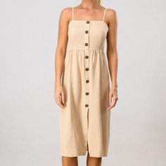 This Super-Soft Tencel Dress Goes With Anything And Everything. Pair It With White Sneakers And A Denim Jacket For A Casual Look Or Dress It Up With Heels For A Daytime Wedding. Features Adjustable Straps And A Non-Functional Button Front. - 100% Tencel Measurements Are Approximate And Taken While Laying Flat Across The Front. Not Doubled. Small - Bust: 14.5”Waist: 13”Length: 41” Medium - Bust: 15”Waist: 14”Length: 41.5” Large - Bust: 16”Waist: 15”Length: 42” Casual Beige Sundress With Adjustable Straps, Casual Beige Sundress With Spaghetti Straps, Beige Button-up Midi Dress For Vacation, Beach Sundress With Spaghetti Straps And Buttons, Spaghetti Strap Sundress With Buttons For Beach, Summer Sundress With Spaghetti Straps And Buttons, Button-up Midi Dress For Summer, Beige Button-up Midi Dress For Beach, Summer Button-up Midi Dress With Button Closure